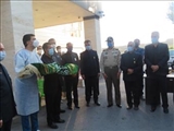 اهداء  پرچم امام رضا(ع) در روز عاشورای حسینی به بیمارستان امیرالمومنین(ع) مراغه
